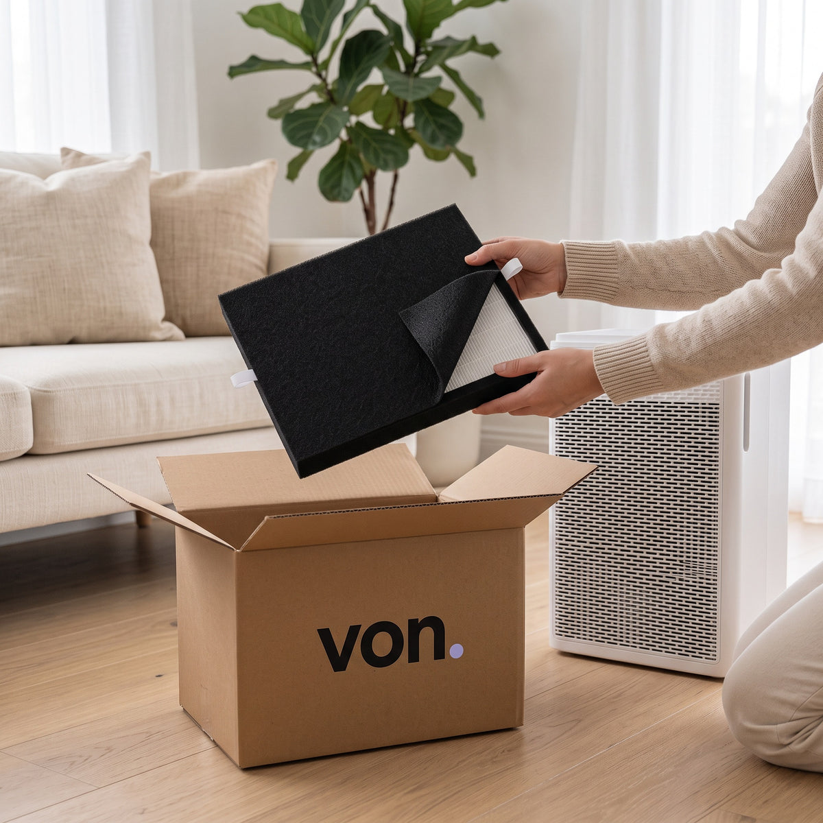 Replacement Von filter taken out of its delivery box, next to the Von Air Purifier